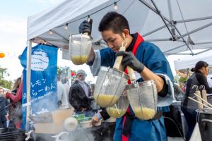 Chefs slinging ramen